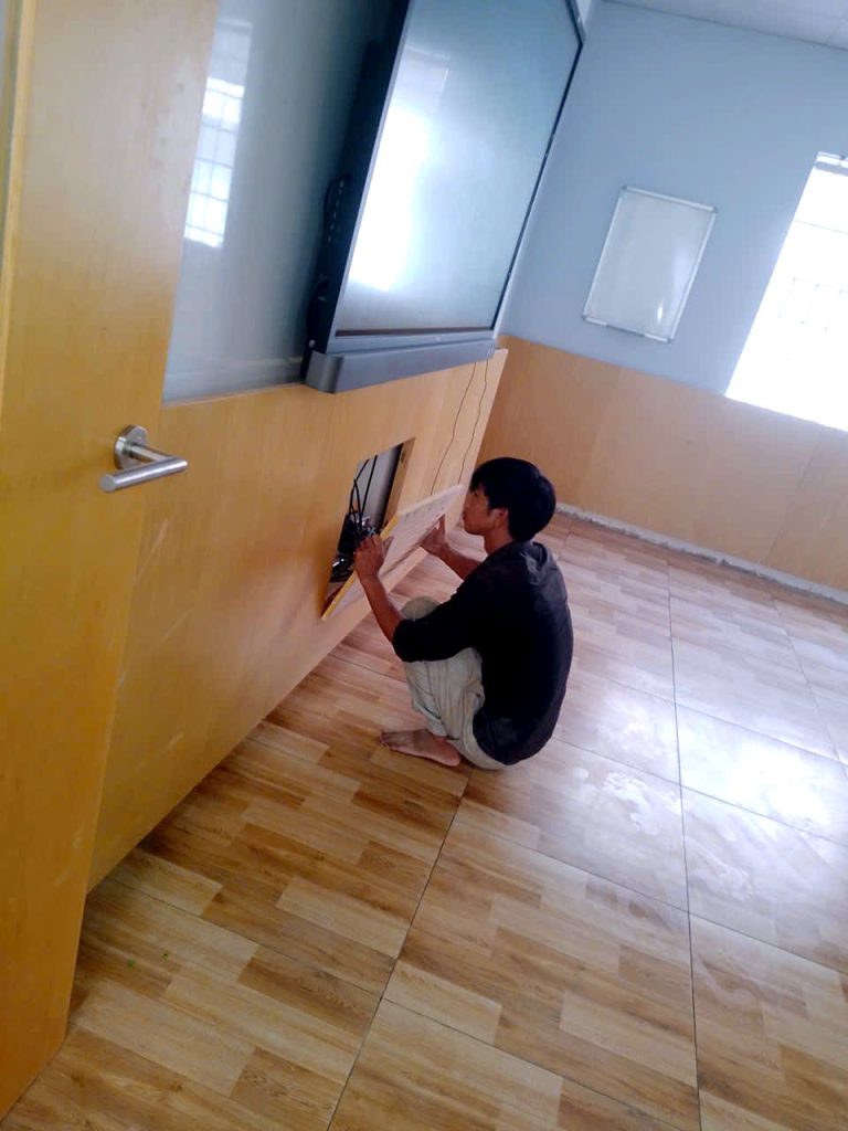 Repairing and refixing classroom timber wall panels