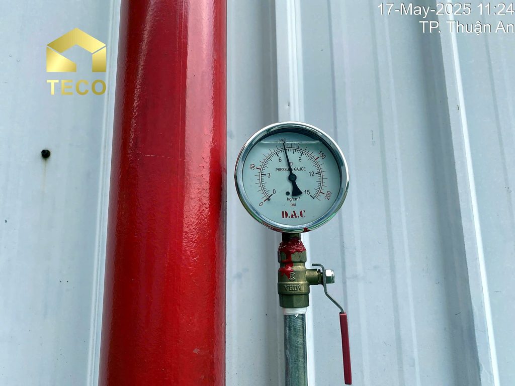 Pressure gauge on a fire water pipe during fire protection maintenance