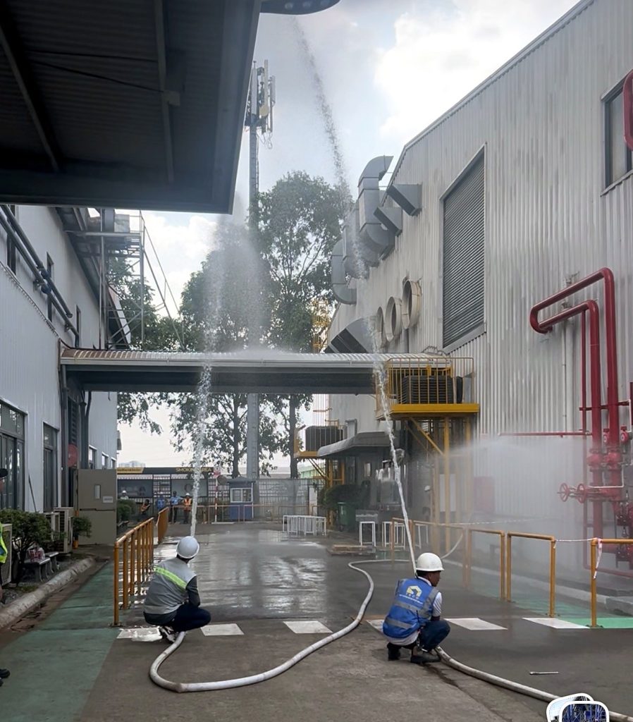 Flow test at an outdoor fire hydrant during fire protection maintenance