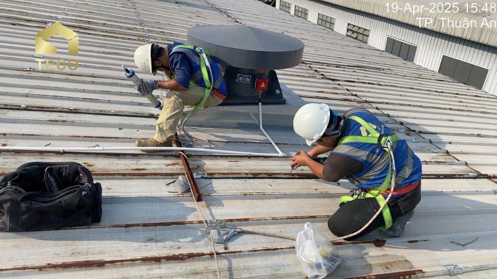 Replacing roofing screws on a factory metal roof at VSIP 1