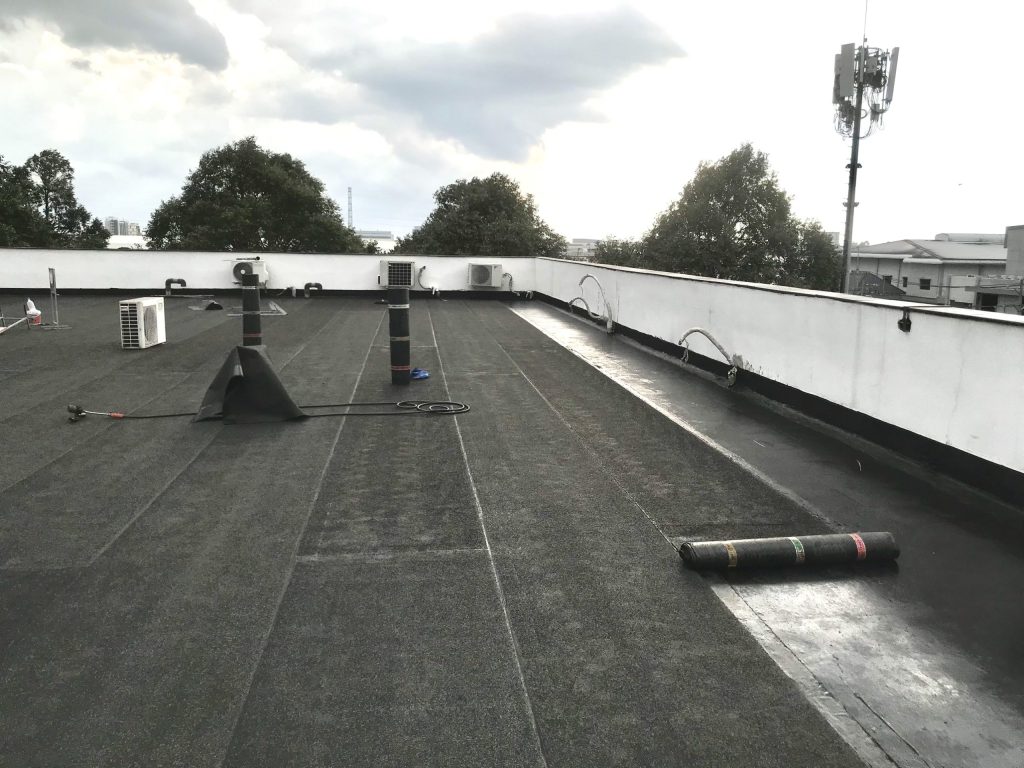 Vent pipe penetration wrapped with reinforcing membrane, Lemax membrane roll on the roof
