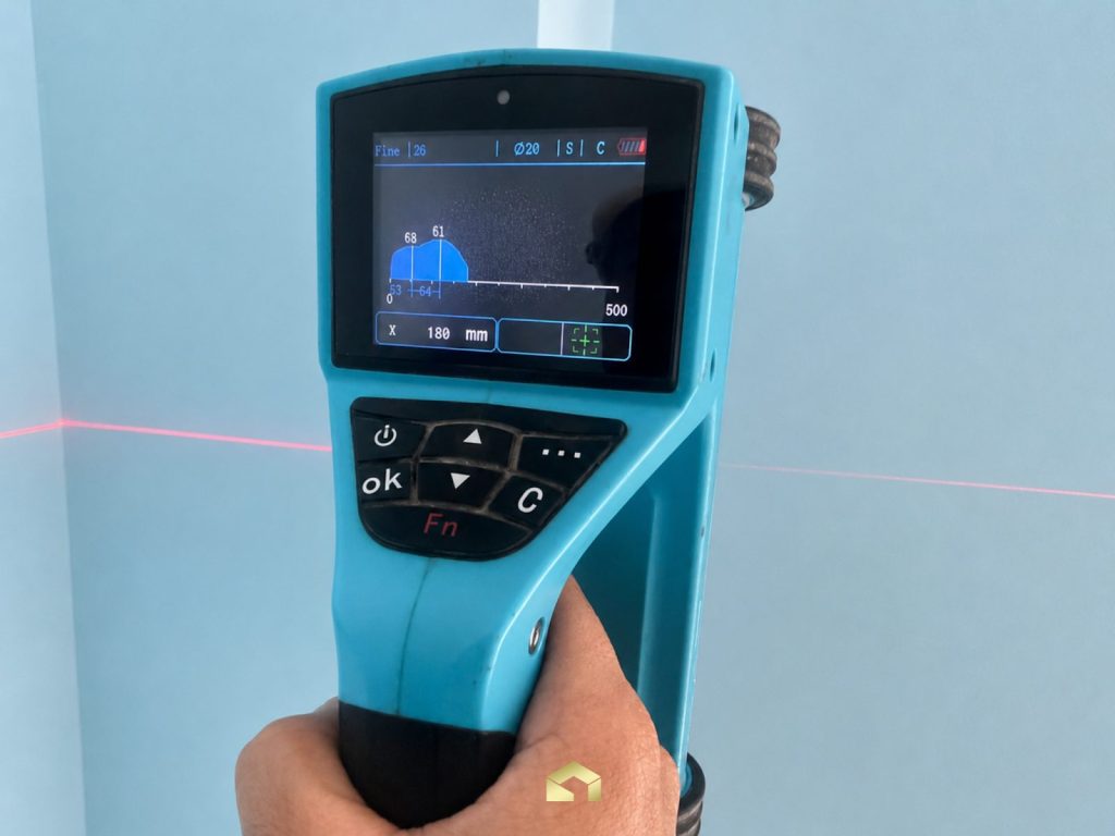 Rebar detector scanning a concrete element