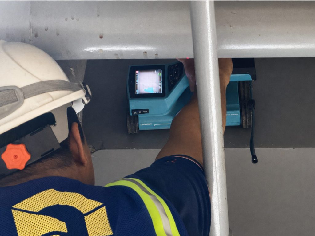 TECO engineer scanning beam reinforcement
