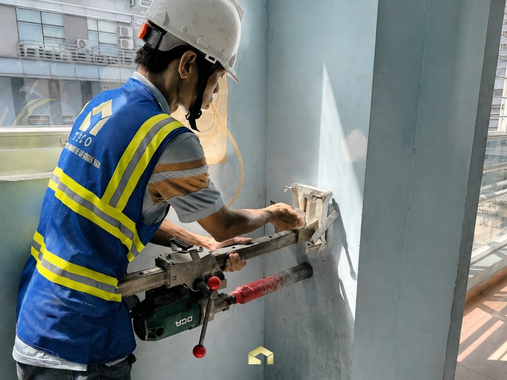 TECO engineer performing structural assessment at Sao Viet School