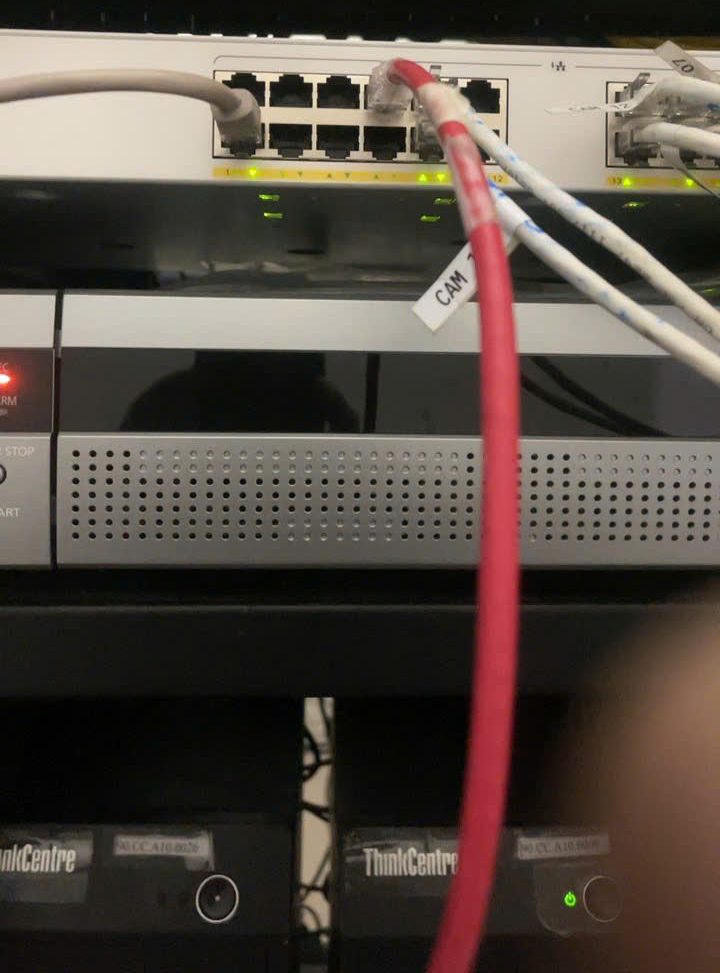 Inspecting the rack, CCTV recorder and network switch